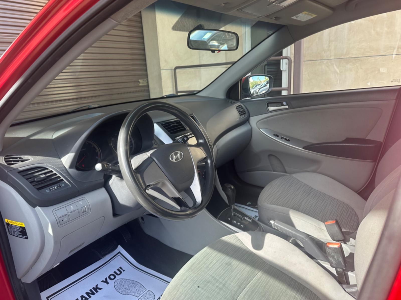 2015 Red /Gray Hyundai Accent GLS Sedan 4D (KMHCT4AE2FU) with an 4-Cyl, 1.6L engine, Auto, 6-Spd w/Overdrive transmission, located at 30 S. Berkeley Avenue, Pasadena, CA, 91107, (626) 248-7567, 34.145447, -118.109398 - The 2015 Hyundai Accent 4-Door Sedan stands as a testament to Hyundai's commitment to quality, efficiency, and value. Located in Pasadena, CA, our dealership specializes in providing a wide range of used BHPH (Buy Here Pay Here) cars, trucks, SUVs, and vans, including the remarkable Hyundai Accent. - Photo #19